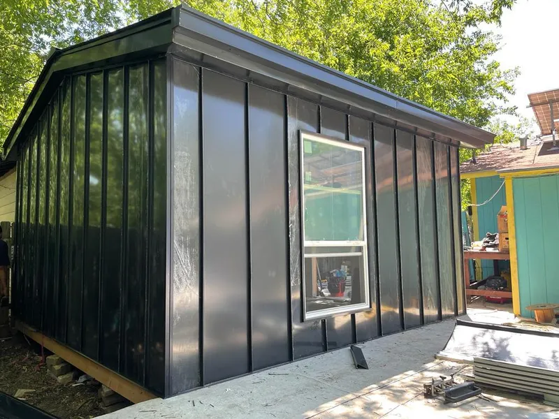 Black standing seam metal wall panels for Roof Inspection in Sulphur Springs