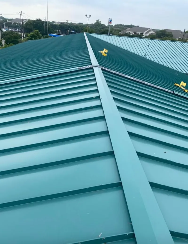 Green commercial metal roof ridge and valley for Metal Roof Repair in Sulphur Springs